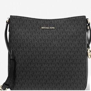 SOLD! MICHAEL MICHAEL KORS
Jet Set Travel Large Logo Messenger
Bag